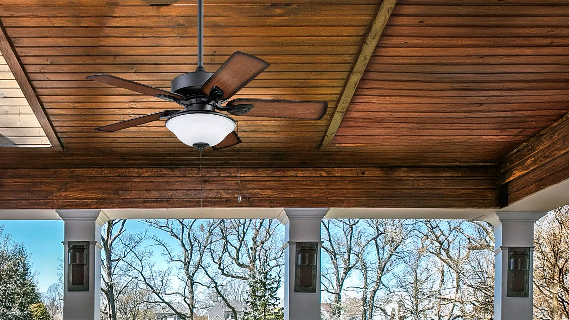 Electrician testing ceiling fan speeds after installation in Brisbane