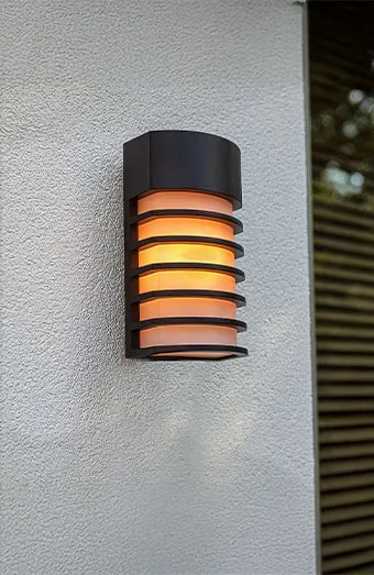 Outdoor security and garden lighting switched on at dusk at a Brisbane home